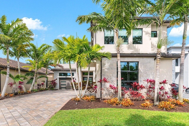 17165 Abruzzo Ave, Boca Raton, FL 33496 - view of front of house featuring driveway and stucco siding