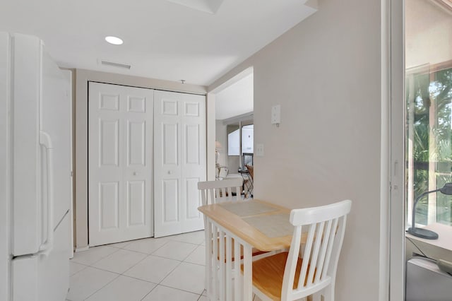1625 Bridgewood Dr, Boca Raton, FL 33434 - dining room featuring light tile patterned floors and visible vents