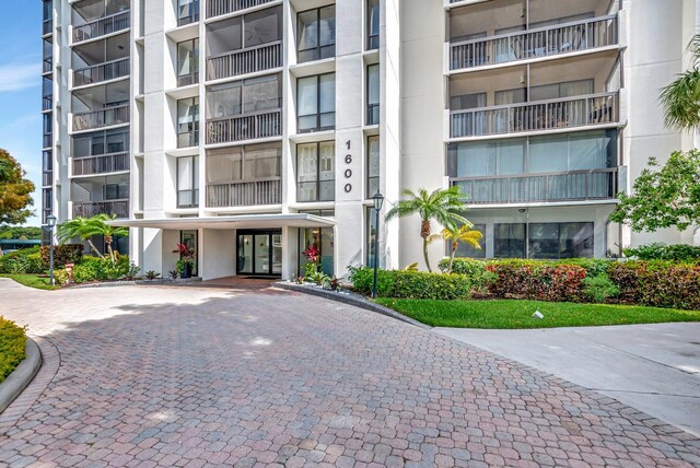 1625 Bridgewood Dr, Boca Raton, FL 33434 - view of building exterior with decorative driveway