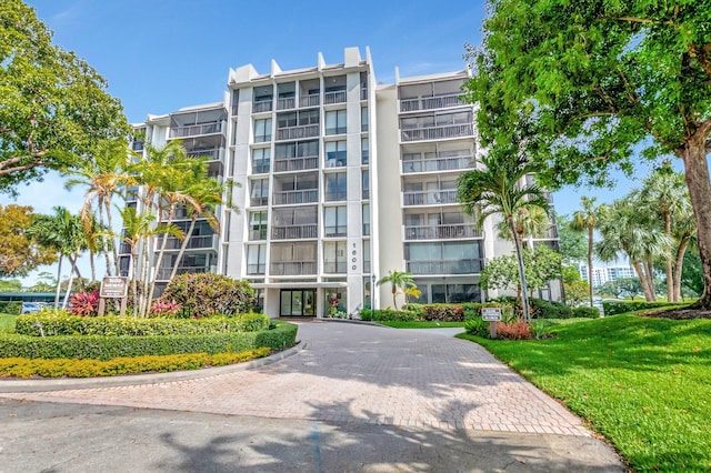 1625 Bridgewood Dr, Boca Raton, FL 33434 - view of property featuring decorative driveway