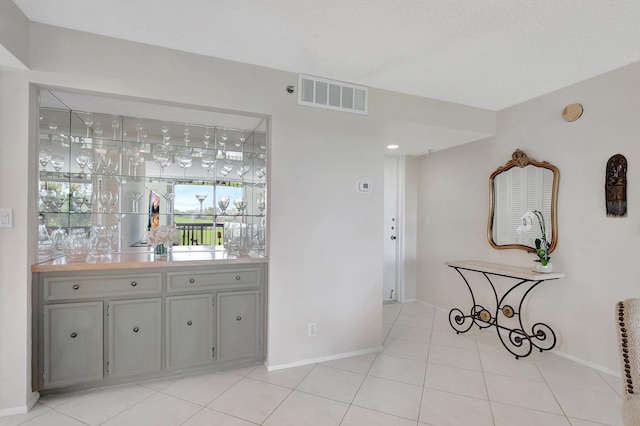 1625 Bridgewood Dr, Boca Raton, FL 33434 - interior space with baseboards, light tile patterned floors, and visible vents
