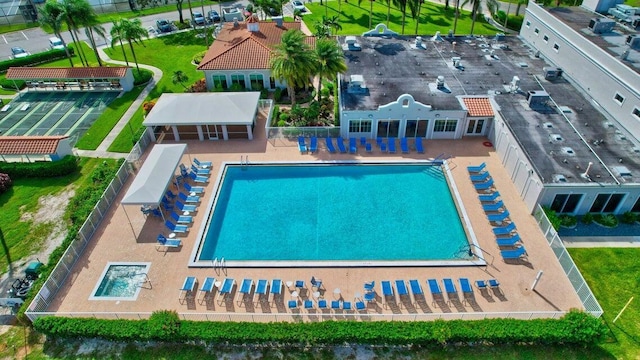 community pool featuring fence