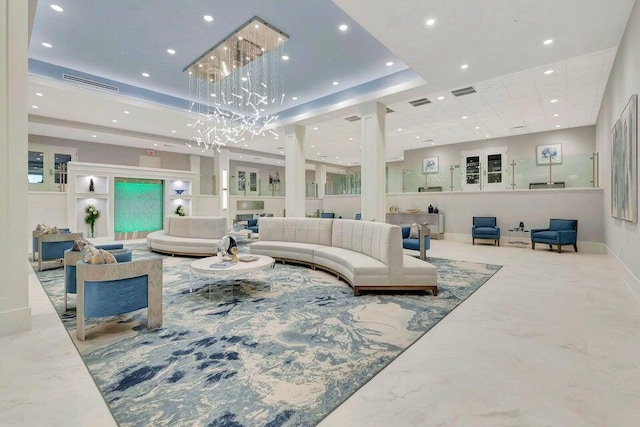 living area featuring marble finish floor, visible vents, and recessed lighting