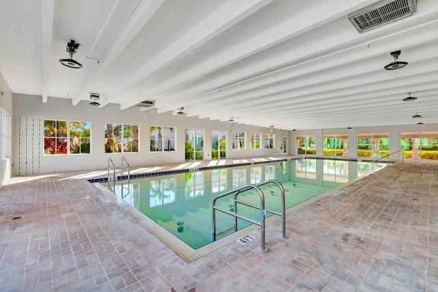 pool with a patio area