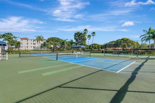 view of sport court with fence