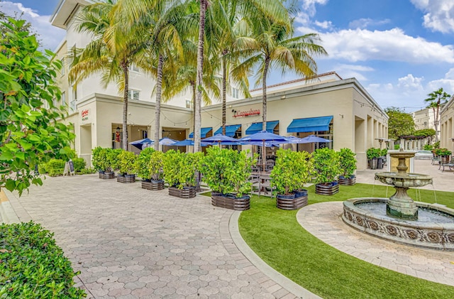 surrounding community with a yard
