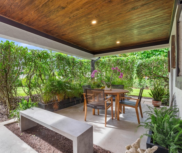 13268 Polo Club Rd Unit A104, Wellington, FL 33414 - view of patio / terrace featuring outdoor dining area