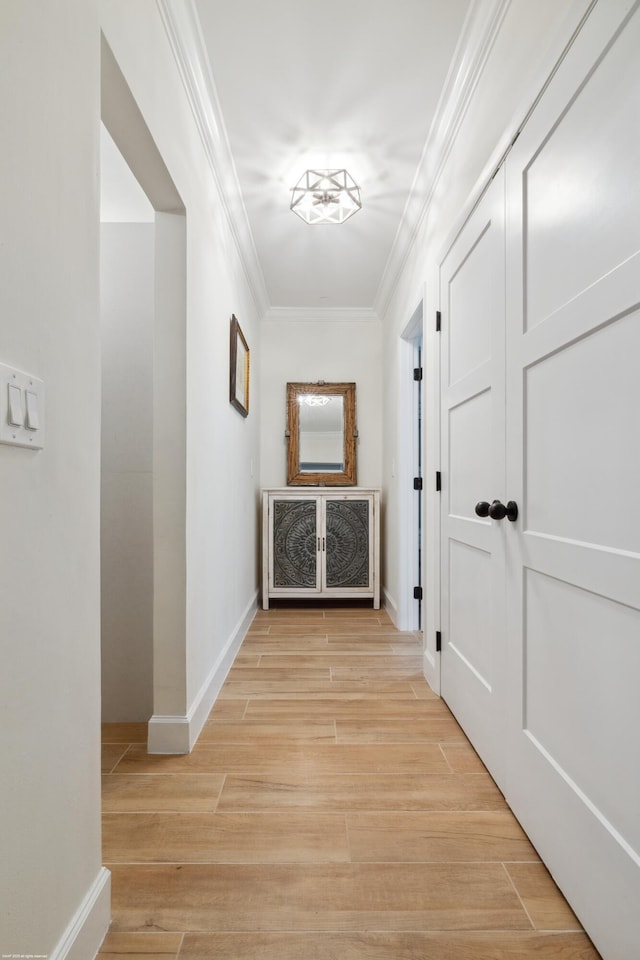 13268 Polo Club Rd Unit A104, Wellington, FL 33414 - hall featuring light wood-style flooring, crown molding, and baseboards
