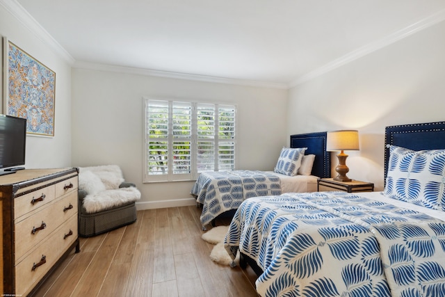 13268 Polo Club Rd Unit A104, Wellington, FL 33414 - bedroom featuring baseboards, crown molding, and wood finished floors