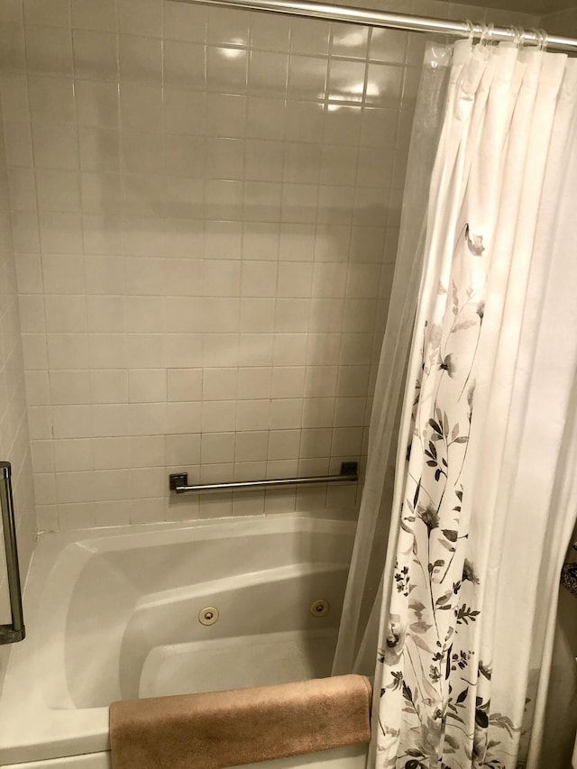bathroom featuring a combined bath / shower with jetted tub