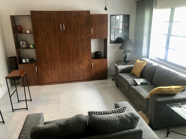 living room with light tile patterned floors