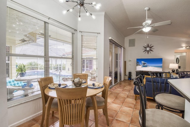 104 Cove Rd, Greenacres, FL 33413 - dining space with crown molding, lofted ceiling, light tile patterned floors, a chandelier, and ceiling fan