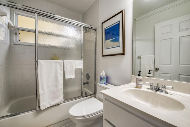 104 Cove Rd, Greenacres, FL 33413 - bathroom featuring vanity, enclosed tub / shower combo, and toilet