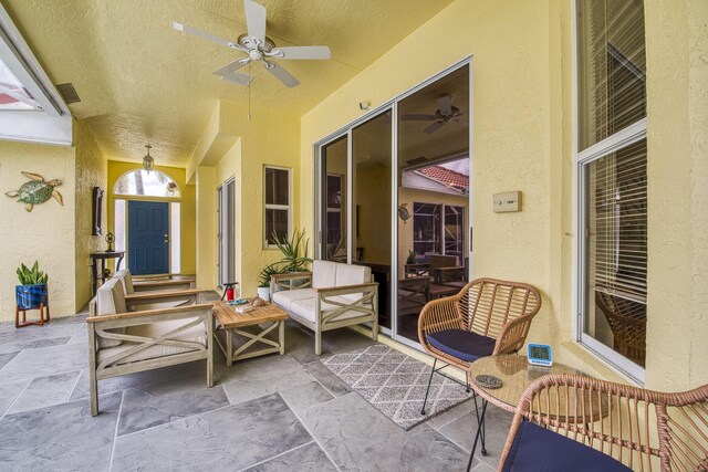 outdoor pool featuring a lanai, a patio, and ceiling fan