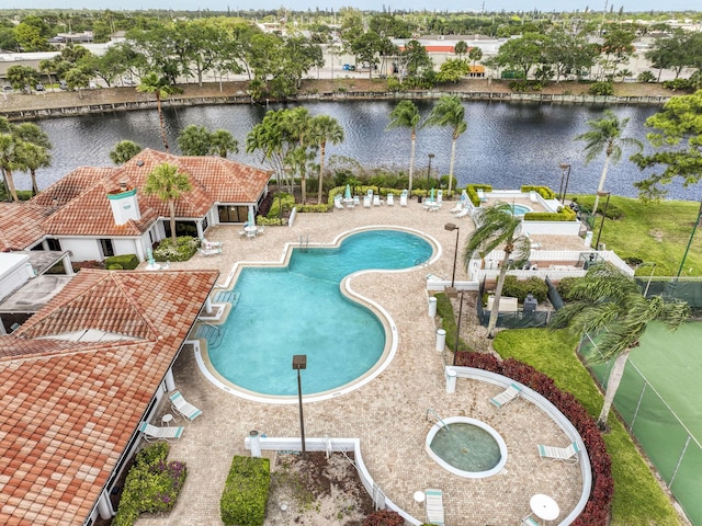 104 Cove Rd, Greenacres, FL 33413 - community pool featuring a water view and a patio