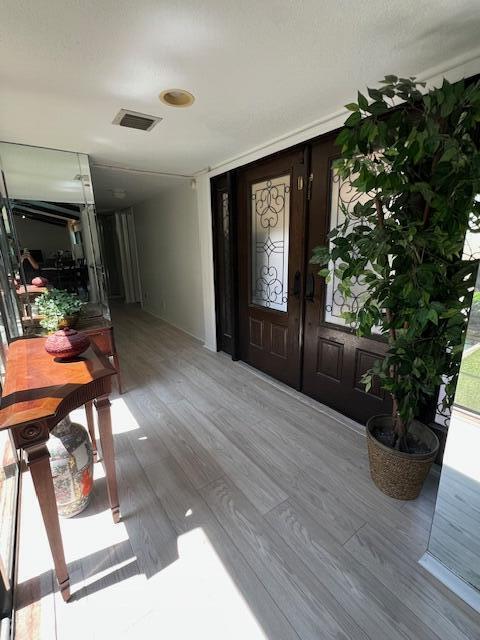 6582 Patio Ln, Boca Raton, FL 33433 - entryway with wood finished floors