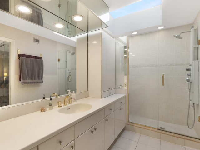 6582 Patio Ln, Boca Raton, FL 33433 - bathroom with a stall shower, vanity, tile patterned flooring, and recessed lighting