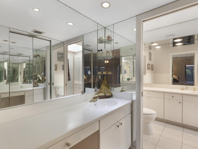 6582 Patio Ln, Boca Raton, FL 33433 - full bath with toilet, vanity, tile patterned flooring, and recessed lighting