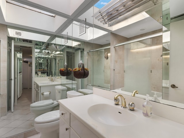 bathroom featuring a shower stall, tile patterned flooring, visible vents, toilet, and a sink