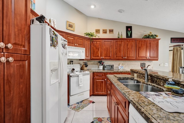 8933 NW 3rd Ct, Coral Springs, FL 33071 - kitchen with lofted ceiling, light stone counters, white appliances, decorative backsplash, and a sink