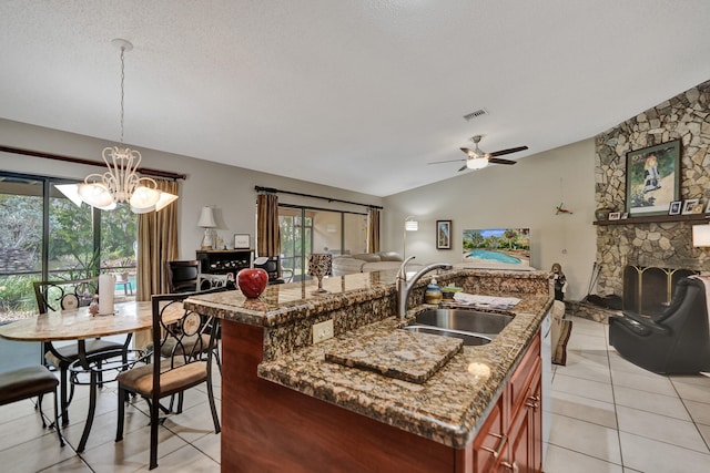 8933 NW 3rd Ct, Coral Springs, FL 33071 - kitchen with open floor plan, light tile patterned floors, visible vents, lofted ceiling, and a sink
