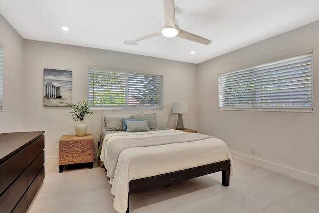 bedroom featuring multiple windows, a ceiling fan, recessed lighting, and baseboards