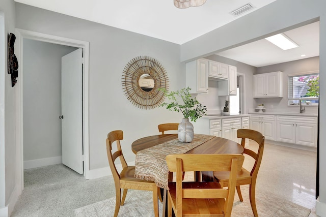 dining space with baseboards