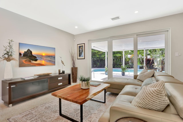 living area with plenty of natural light and recessed lighting