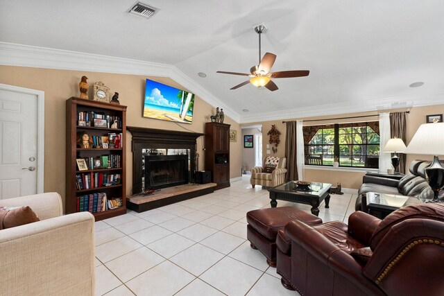 6045 Whipoorwill Ln, Fort Pierce, FL 34987 - living room with a fireplace with raised hearth, lofted ceiling, ceiling fan, light tile patterned floors, and ornamental molding