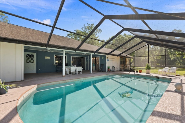 6045 Whipoorwill Ln, Fort Pierce, FL 34987 - outdoor pool featuring a patio area and glass enclosure