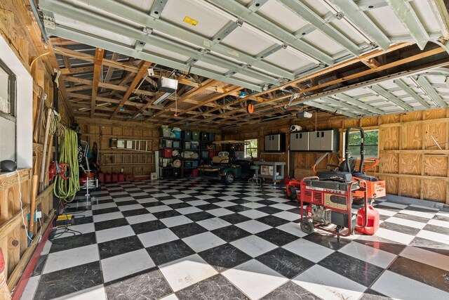6045 Whipoorwill Ln, Fort Pierce, FL 34987 - garage with wooden walls