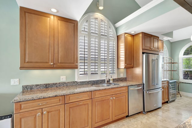 1485 Bear Island Dr, West Palm Beach, FL 33409 - kitchen with baseboards, light stone counters, recessed lighting, appliances with stainless steel finishes, and a sink