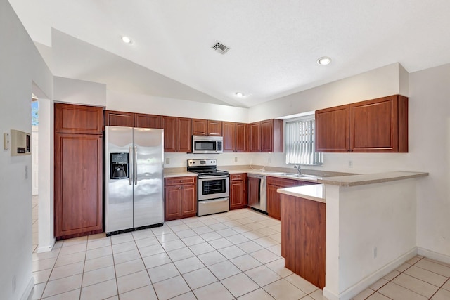 2445 Stonegate Dr, Wellington, FL 33414 - kitchen with a sink, light countertops, a peninsula, and stainless steel appliances