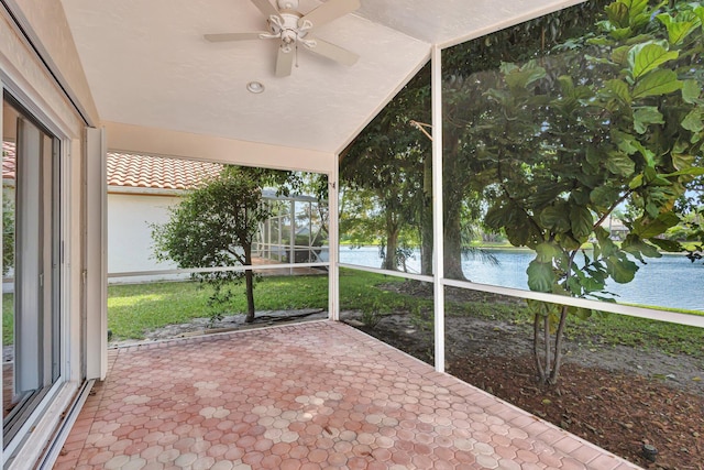 2445 Stonegate Dr, Wellington, FL 33414 - unfurnished sunroom featuring a water view and ceiling fan