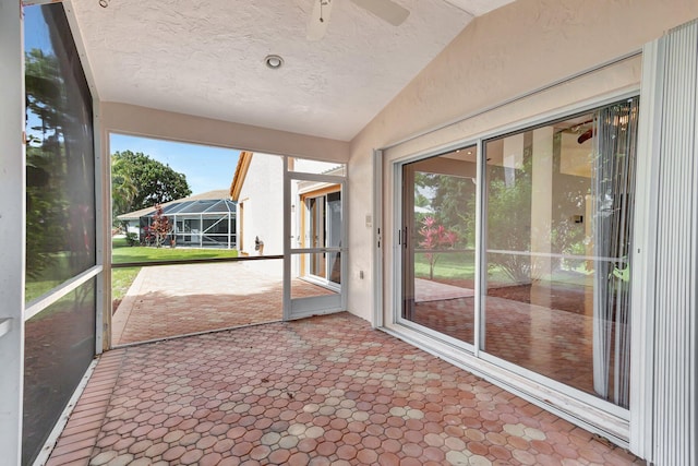 2445 Stonegate Dr, Wellington, FL 33414 - unfurnished sunroom featuring ceiling fan