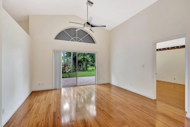 2445 Stonegate Dr, Wellington, FL 33414 - interior space with high vaulted ceiling, light wood finished floors, baseboards, and a ceiling fan