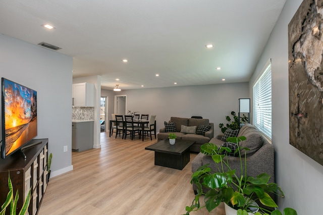 8421 NW 24th St, Sunrise, FL 33322 - living room with recessed lighting, visible vents, and light wood finished floors