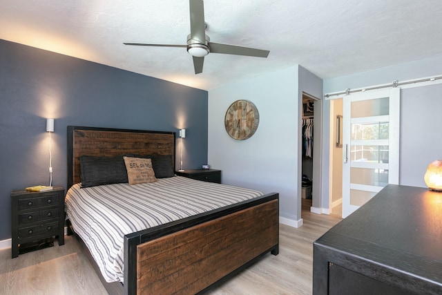 8421 NW 24th St, Sunrise, FL 33322 - bedroom with light wood-style floors, baseboards, and a closet