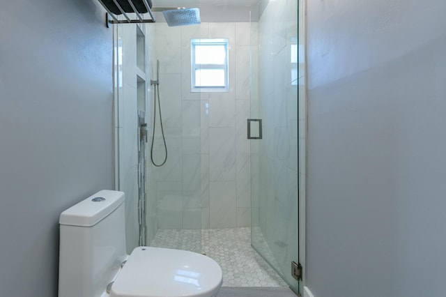 8421 NW 24th St, Sunrise, FL 33322 - bathroom featuring a stall shower and toilet