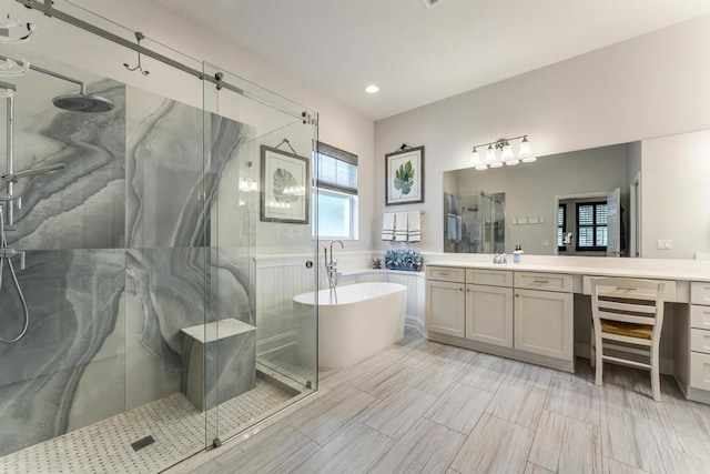 1345 Bourne Dr, Jupiter, FL 33458 - bathroom with a soaking tub, a shower stall, and vanity
