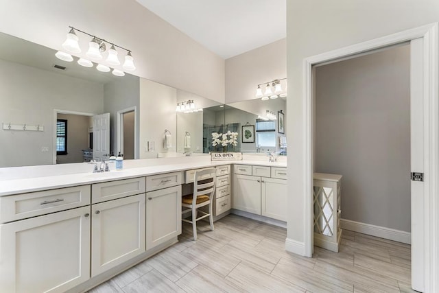 1345 Bourne Dr, Jupiter, FL 33458 - full bath featuring vanity, baseboards, and visible vents