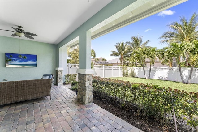 1345 Bourne Dr, Jupiter, FL 33458 - view of patio / terrace with a fenced backyard and ceiling fan