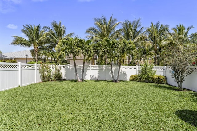 1345 Bourne Dr, Jupiter, FL 33458 - view of yard with a fenced backyard