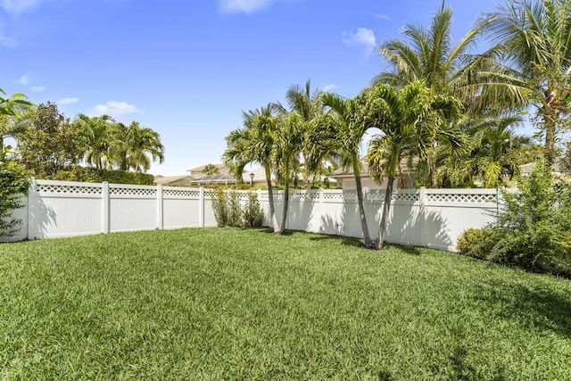 1345 Bourne Dr, Jupiter, FL 33458 - view of yard featuring a fenced backyard