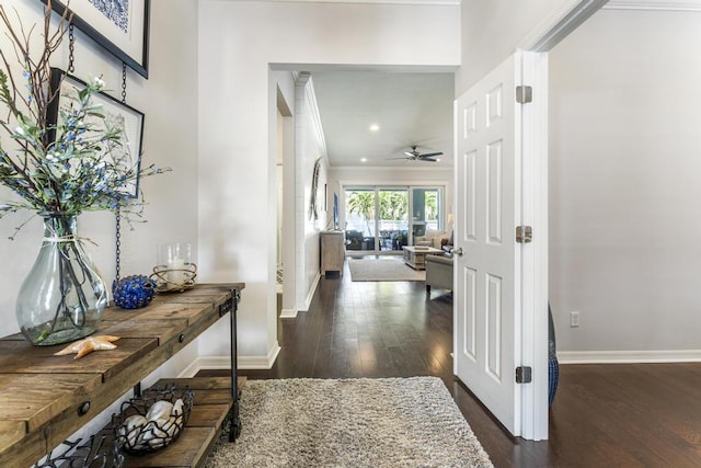 1345 Bourne Dr, Jupiter, FL 33458 - entrance foyer with baseboards, ornamental molding, ceiling fan, dark wood finished floors, and recessed lighting