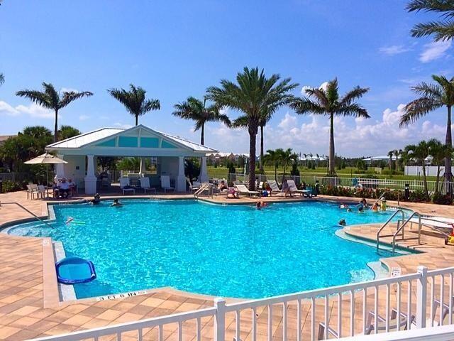 1345 Bourne Dr, Jupiter, FL 33458 - pool featuring a patio area and fence