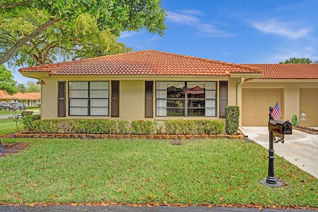 4655 Mahoe Tree Pl Unit A, Boynton Beach, FL 33436 - view of front facade with a tiled roof and stucco siding