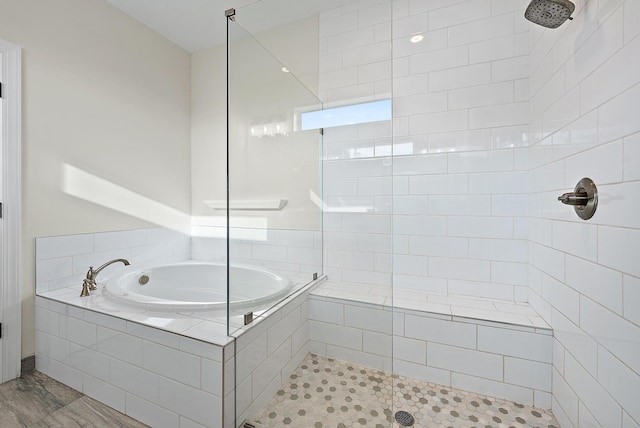 4770 SW Ardsley Dr, Stuart, FL 34997 - bathroom with a tile shower, a bath, and tile patterned flooring