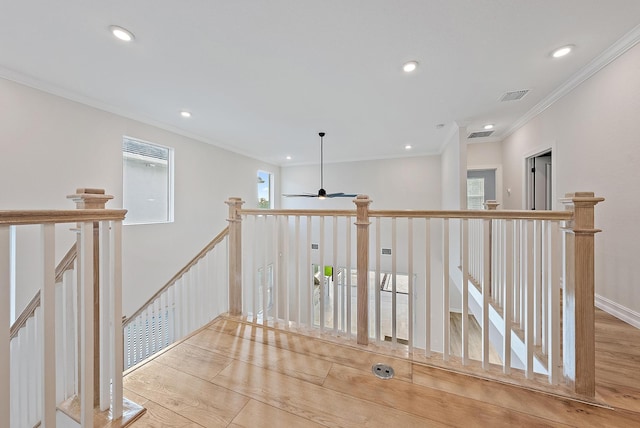4770 SW Ardsley Dr, Stuart, FL 34997 - hall with an upstairs landing, recessed lighting, crown molding, and wood finished floors