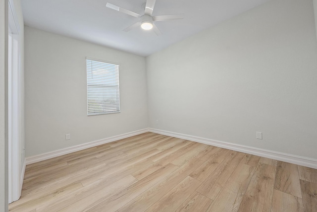 4770 SW Ardsley Dr, Stuart, FL 34997 - empty room featuring light wood-style flooring, baseboards, and a ceiling fan